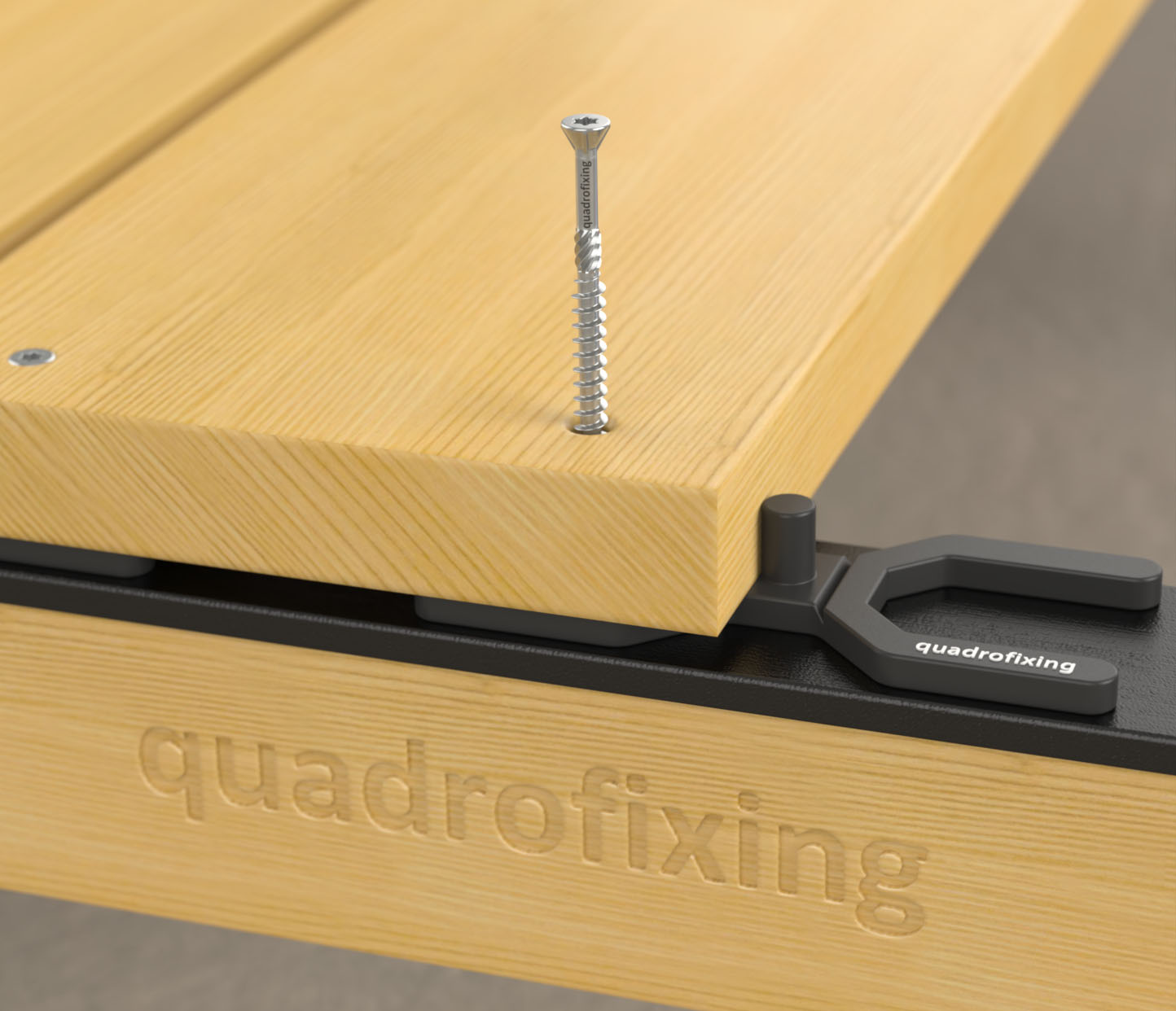 QUADROFIX C2 Terrassenschraube aus Edelstahl bei der Montage einer Terrassendiele.
